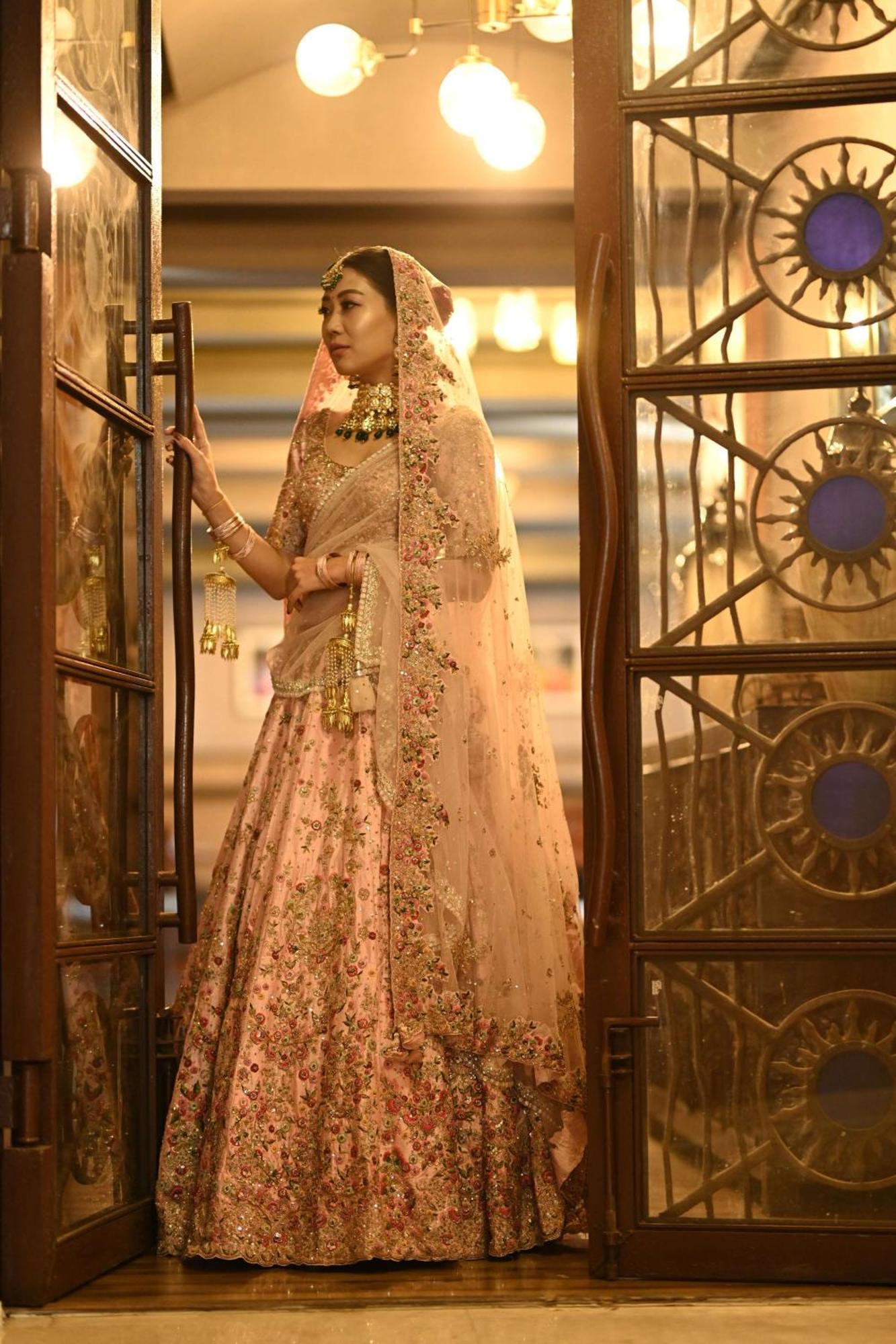 Radisson Blu Hotel Pune Kharadi Exterior photo A woman in a lehenga