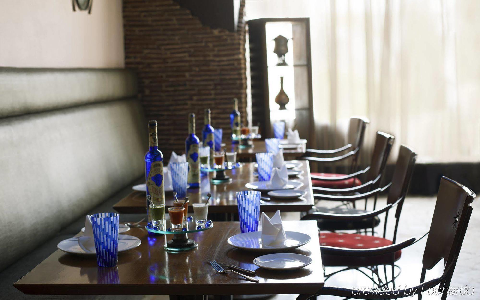 Radisson Blu Hotel Pune Kharadi Exterior photo A table set for a meal